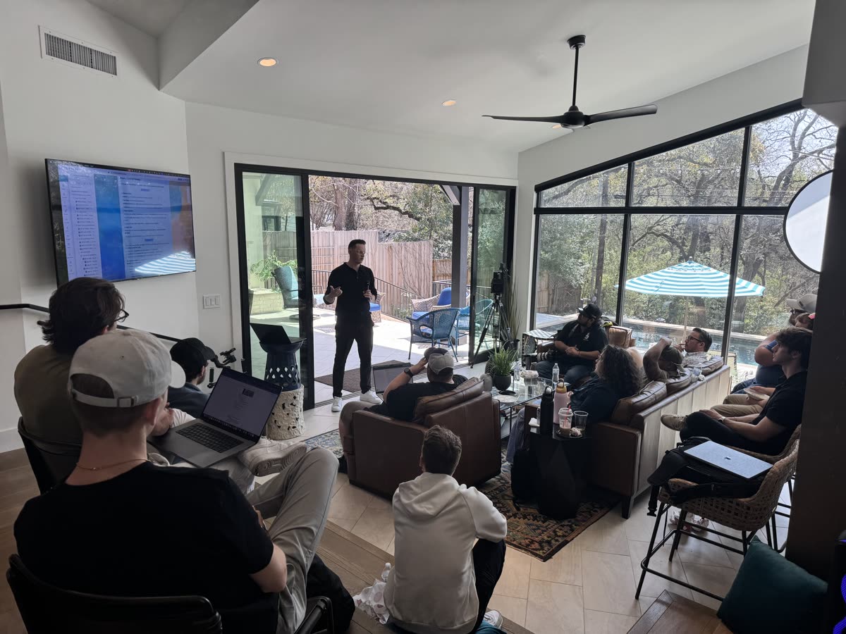 JT leading a workshop in a living room in Austin
