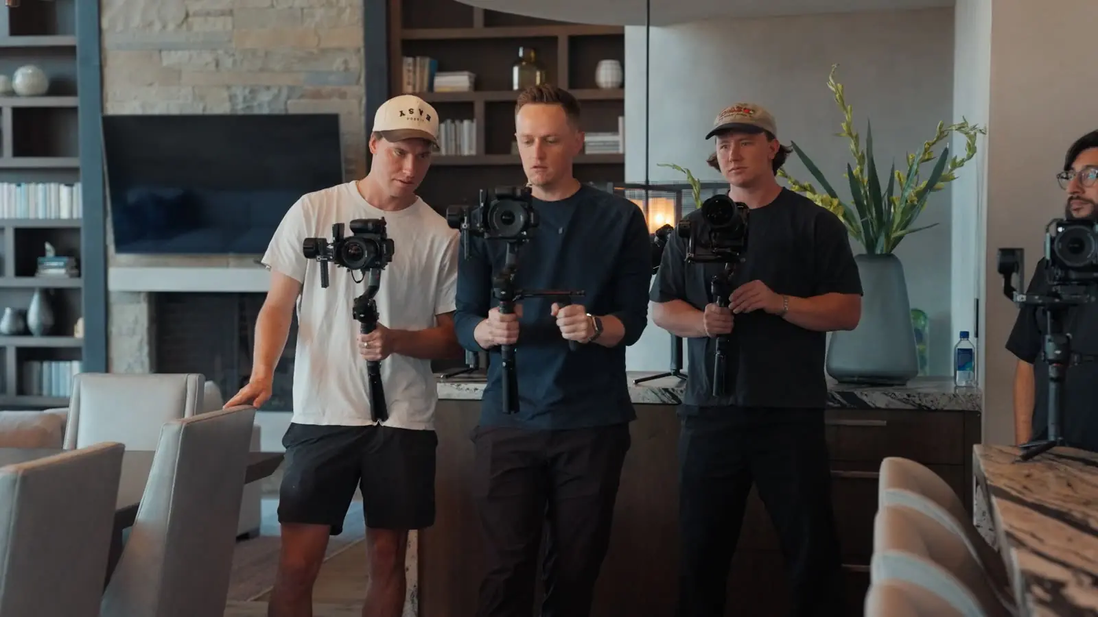 Three videographers practicing gimbal moves