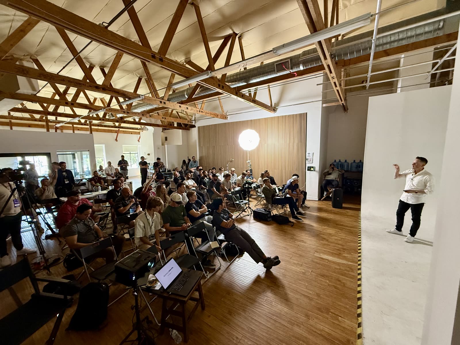 JT speaking to a full room in Los Angeles
